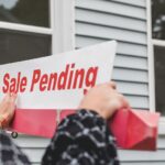 Pending home sale sign showing a property transaction in progress for hidden land costs article context.